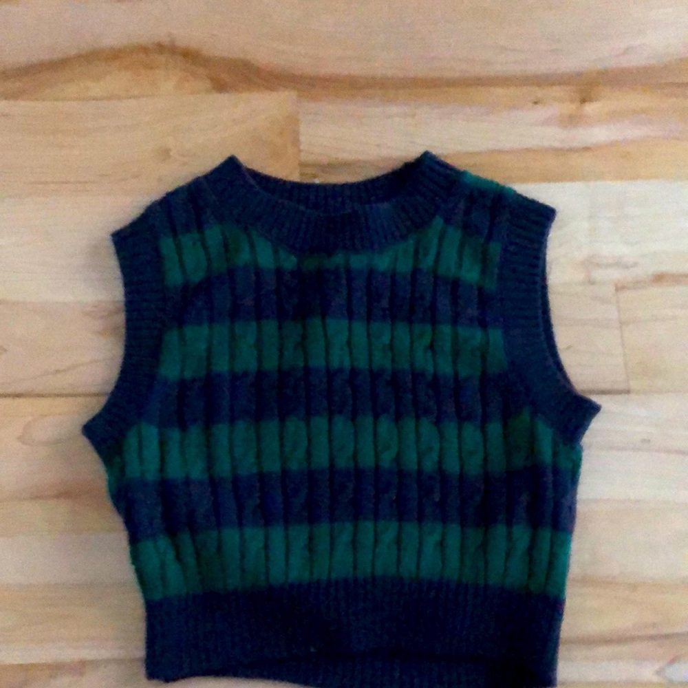Cute sweater vest wore once!